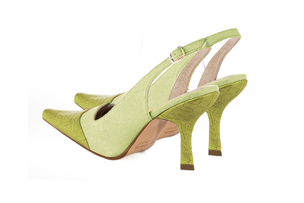 Women's pistachio green and meadow green slingback dress shoes. Pointed toe. High spool heels - Rear view